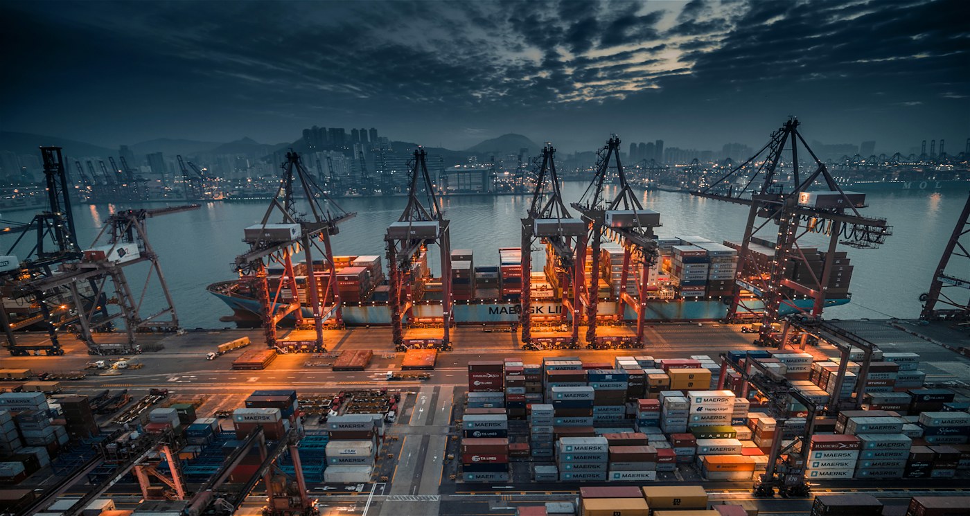 Port cranes at dusk — illustrative marine photography